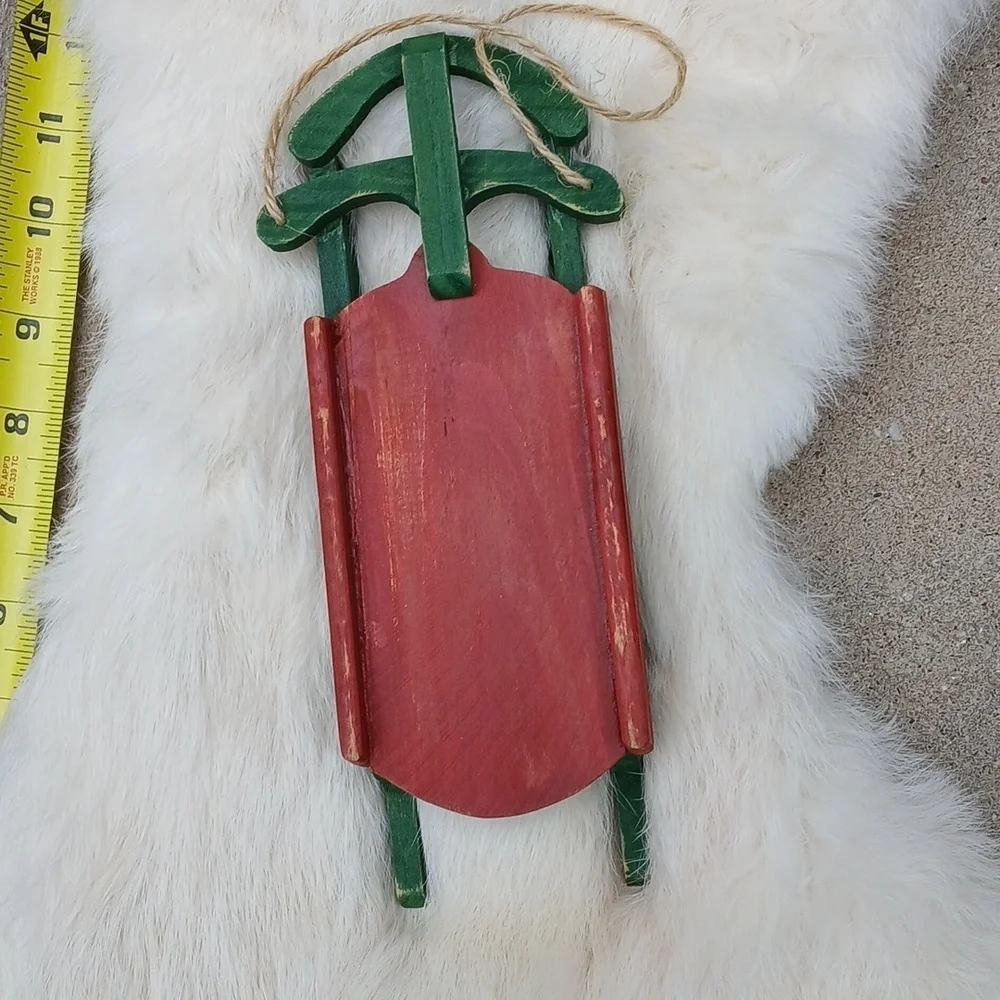 White Rabbit Fur Christmas Stocking with Red and Green Sled